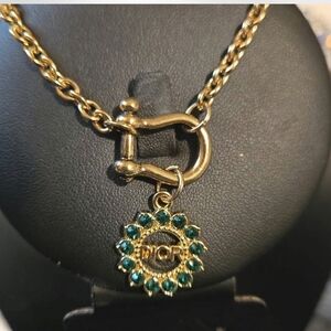 Iconic Logo Horseshoe Bracelet with Emerald Green Crystals